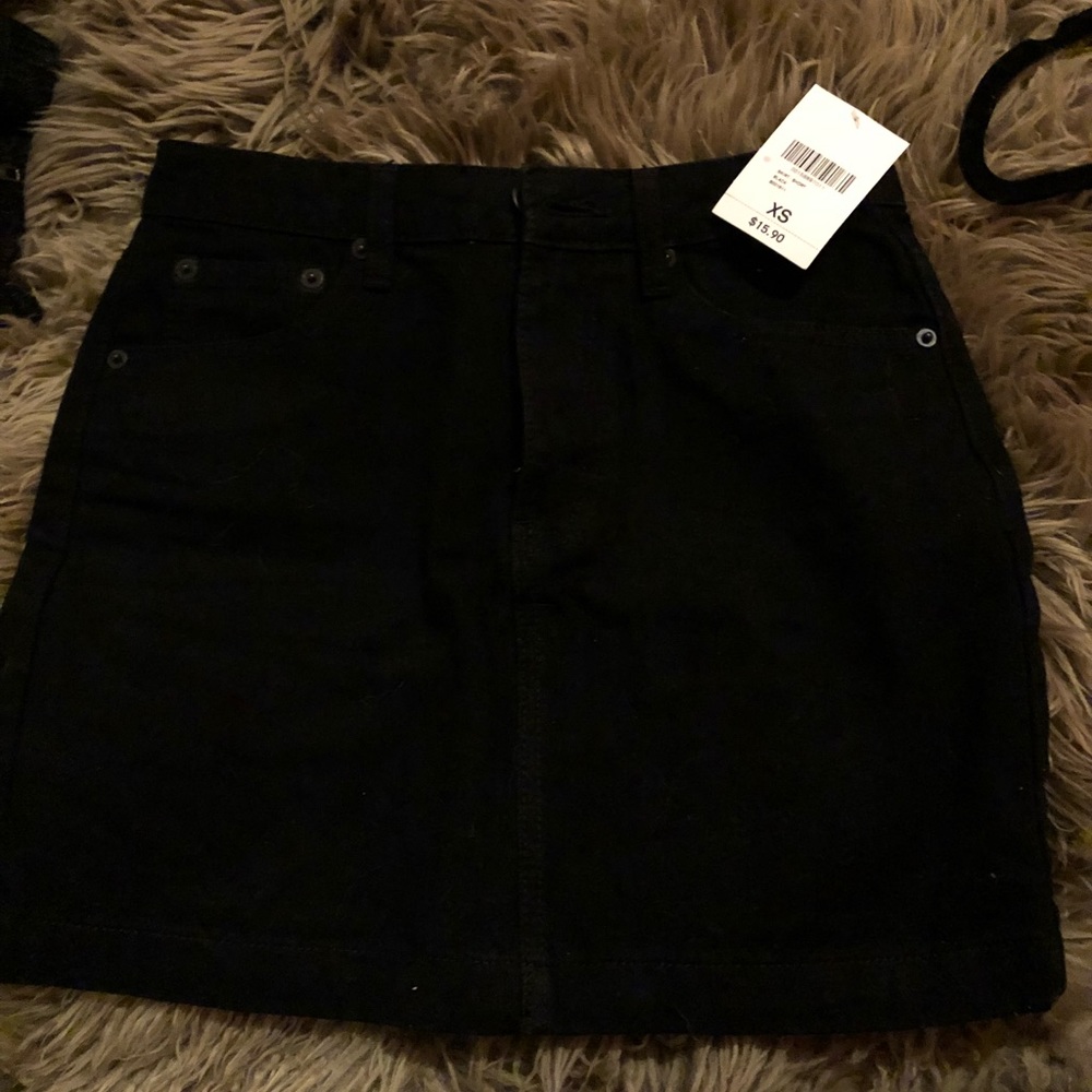 Never worn black denim skirt